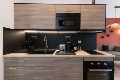 Cuisine ou kitchenette dans l'établissement Republique Bastille Chic & Design Apartment 6P 2BR