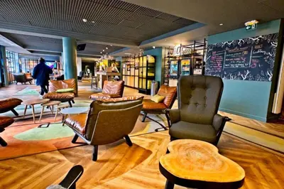 Coin salon dans l'établissement Paris Porte de Versailles Cosy Lodge 1 Appart hôtel parking wifi 4 pers