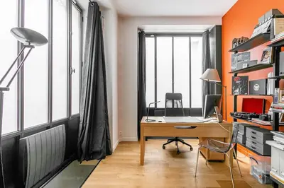 Télévision ou salle de divertissement dans l'établissement Magnifique Duplex haut de gamme à Montorgueil