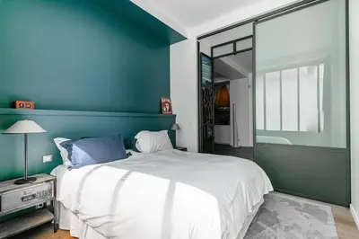 Un ou plusieurs lits dans un hébergement de l'établissement Magnifique Duplex haut de gamme à Montorgueil