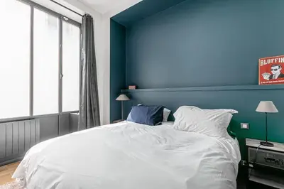 Un ou plusieurs lits dans un hébergement de l'établissement Magnifique Duplex haut de gamme à Montorgueil