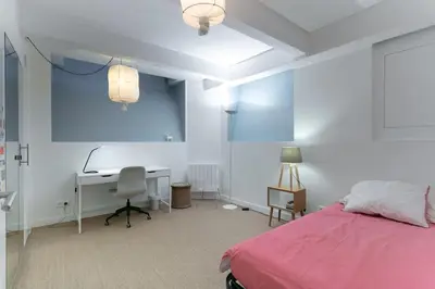 Un ou plusieurs lits dans un hébergement de l'établissement Magnifique Duplex haut de gamme à Montorgueil