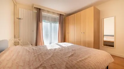 Un ou plusieurs lits dans un hébergement de l'établissement Spacious 3BD Family Apartment Auteuil
