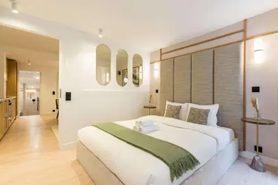 Un ou plusieurs lits dans un hébergement de l'établissement Opéra - Elégant appartement - Haystia