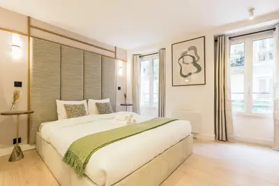 Un ou plusieurs lits dans un hébergement de l'établissement Opéra - Elégant appartement - Haystia