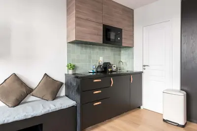 Cuisine ou kitchenette dans l'établissement République - Charmant studio - Haystia