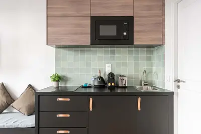 Cuisine ou kitchenette dans l'établissement République - Charmant studio - Haystia