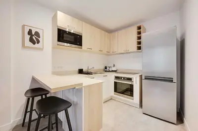 Cuisine ou kitchenette dans l'établissement Cosy apartment - 1BDR-4P - Boulogne Billancourt