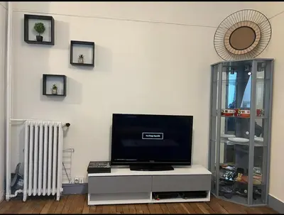 Télévision ou salle de divertissement dans l'établissement Studio proche Paris, proche meteo 4,13
