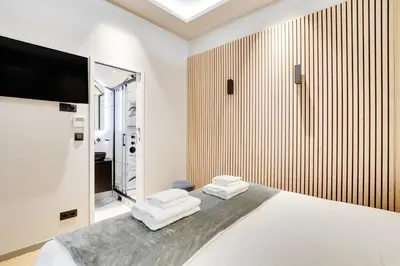 Un ou plusieurs lits dans un hébergement de l'établissement Pick A Flat's apartment in Champs-Elysées - Rue Marbeuf