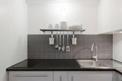 Cuisine ou kitchenette dans l'établissement Appartement avec beaux volumes cœur du MARAIS