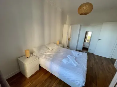 Un ou plusieurs lits dans un hébergement de l'établissement Appartement à Gentilly, à 2 pas de Paris