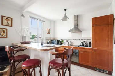 Cuisine ou kitchenette dans l'établissement Appartement Gutenberg - Welkeys