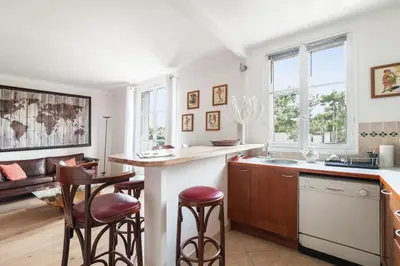 Cuisine ou kitchenette dans l'établissement Appartement Gutenberg - Welkeys