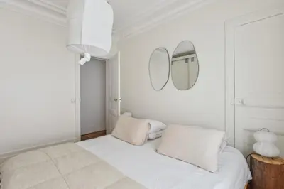 Un ou plusieurs lits dans un hébergement de l'établissement Appartement Mapio