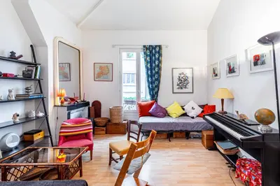 Coin salon dans l'établissement GuestReady - Loft Élégant pour Deux avec Bureau