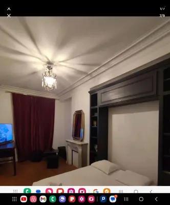 Télévision ou salle de divertissement dans l'établissement L'avenue Montaigne