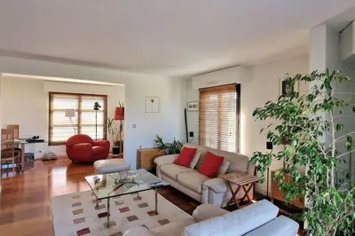 Coin salon dans l'établissement Duplex double terrasses 4P