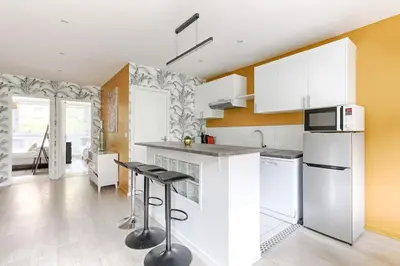 Cuisine ou kitchenette dans l'établissement Beaugrenelle Tour Eiffel II Cosy Apartment 2BR