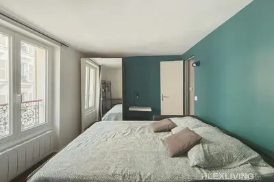 Un ou plusieurs lits dans un hébergement de l'établissement Flexliving - Studio - Martyrs