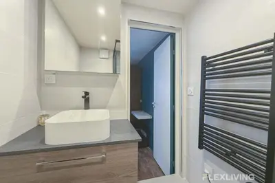 Salle de bains dans l'établissement Flexliving - Studio - Martyrs