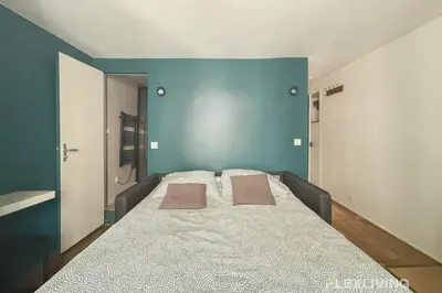 Un ou plusieurs lits dans un hébergement de l'établissement Flexliving - Studio - Martyrs