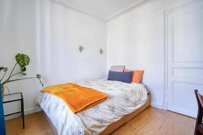Un ou plusieurs lits dans un hébergement de l'établissement Cloysia Studio 18eme - 15 min à pied de montmartre