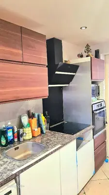 Cuisine ou kitchenette dans l'établissement Chambre meublée dans une maison haut de gamme avec jardin proche métro