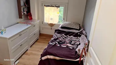 Un ou plusieurs lits dans un hébergement de l'établissement Chambre meublée dans une maison haut de gamme avec jardin proche métro