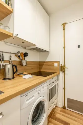 Cuisine ou kitchenette dans l'établissement Cozy 1-bedroom apartment with all amenities near iconic Montmartre neighbourhood