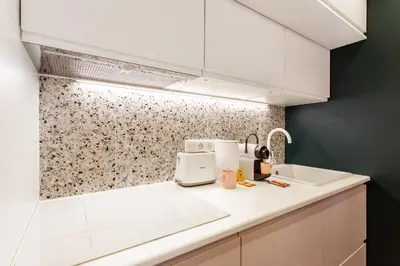 Cuisine ou kitchenette dans l'établissement Stunning apartment - 2BR-6P - Paris Center