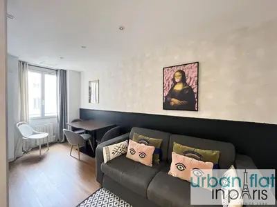 Coin salon dans l'établissement Urban Flat 04 - Pretty 2 Bedroom Flat in Montorgueil