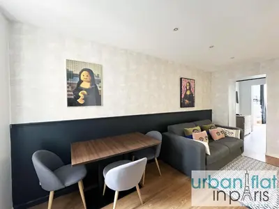 Coin salon dans l'établissement Urban Flat 04 - Pretty 2 Bedroom Flat in Montorgueil