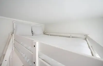 Un ou plusieurs lits dans un hébergement de l'établissement Close to Montmartre l Fully equipped studio
