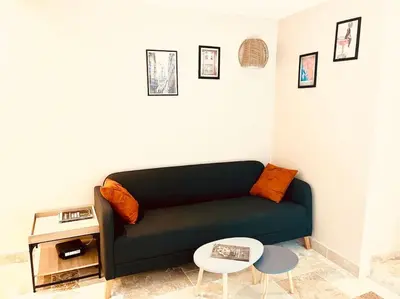 Coin salon dans l'établissement Stylish Loft Paris 17- 3 bdrs - 2 bathrs - 7 pers