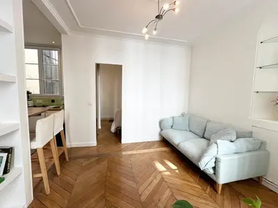 Coin salon dans l'établissement Appartement à côté du Musée Grévin