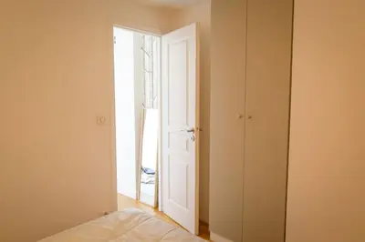 Un ou plusieurs lits dans un hébergement de l'établissement Appartement Chic & Spacieux | Paris 2ème