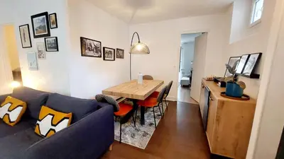 Coin salon dans l'établissement Beau et charmant appartement à Bastille