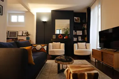 Télévision ou salle de divertissement dans l'établissement Beau et charmant appartement à Bastille