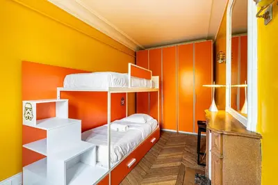 Un ou plusieurs lits dans un hébergement de l'établissement GuestReady - Séjour Cosy Familial pour 4