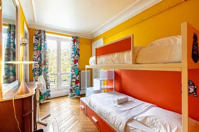 Un ou plusieurs lits dans un hébergement de l'établissement GuestReady - Séjour Cosy Familial pour 4