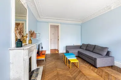 Coin salon dans l'établissement GuestReady - Séjour Cosy Familial pour 4