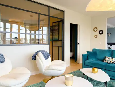 Coin salon dans l'établissement Appartement Spacieux pour 6 - Passy, Paris