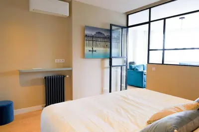 Un ou plusieurs lits dans un hébergement de l'établissement Appartement Spacieux pour 6 - Passy, Paris