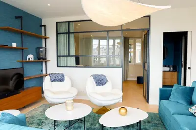 Coin salon dans l'établissement Appartement Spacieux pour 6 - Passy, Paris