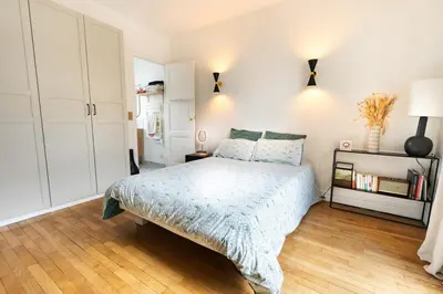 Un ou plusieurs lits dans un hébergement de l'établissement Très lumineux. 1 chambre Batignolles / Opéra.