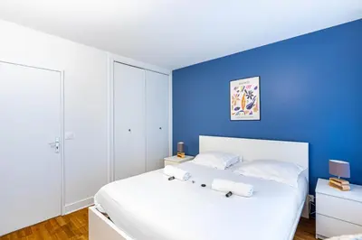 Un ou plusieurs lits dans un hébergement de l'établissement GuestReady - Séjour Élégant à Paris pour 6