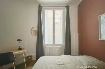 Un ou plusieurs lits dans un hébergement de l'établissement Flexliving - 99 Felix Faure - Whole apartment