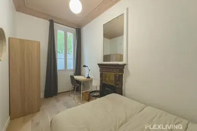 Un ou plusieurs lits dans un hébergement de l'établissement Flexliving - 99 Felix Faure - Whole apartment