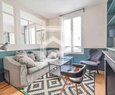 Coin salon dans l'établissement Eiffel Tower Invalides Cosy Flat
